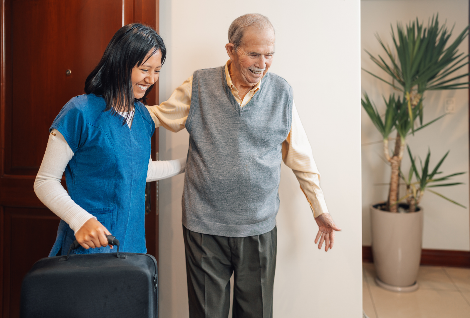 Adult respite guest receiving a warm host-home welcome
